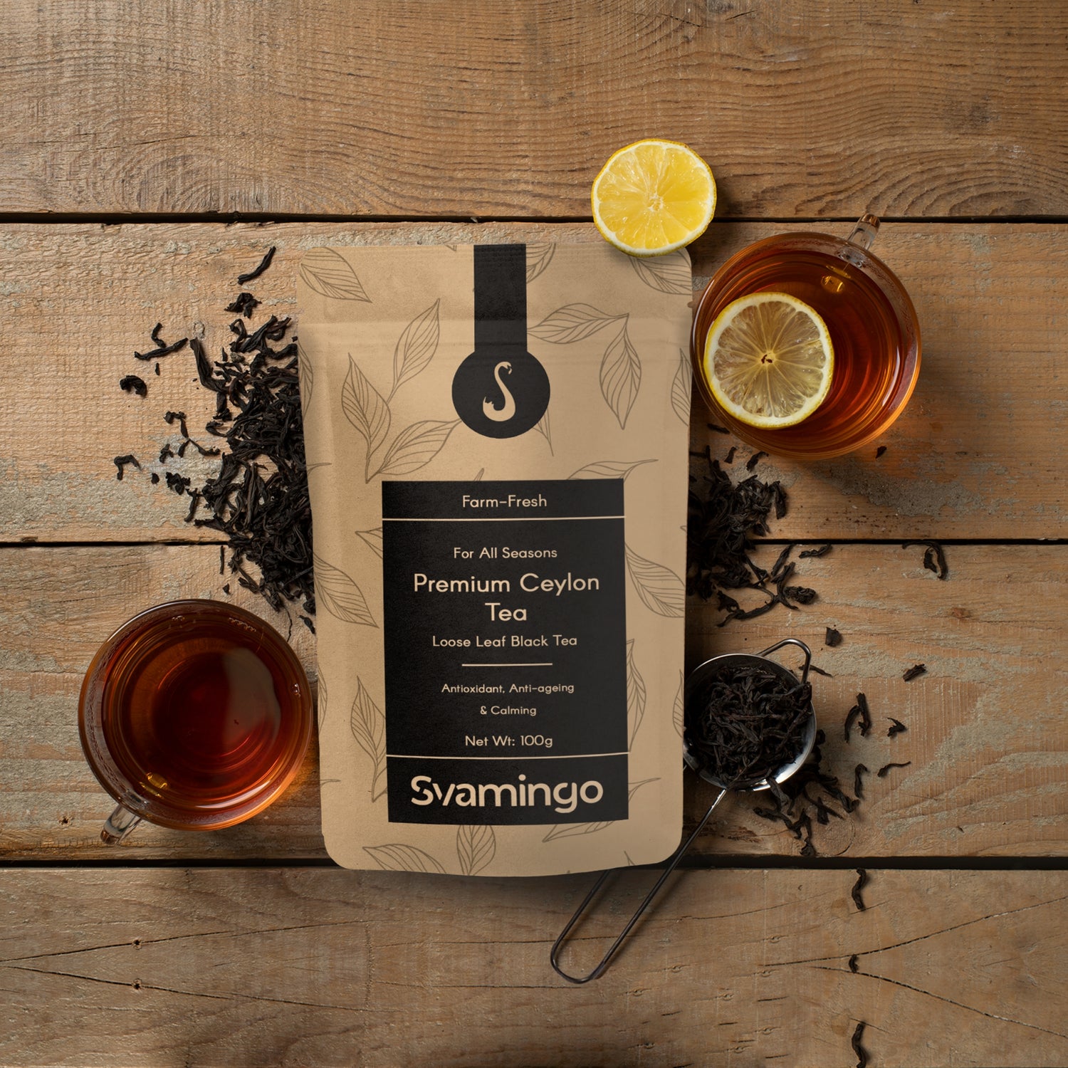 100g pouch of Ceylon black tea from Svamingo on wooden floor