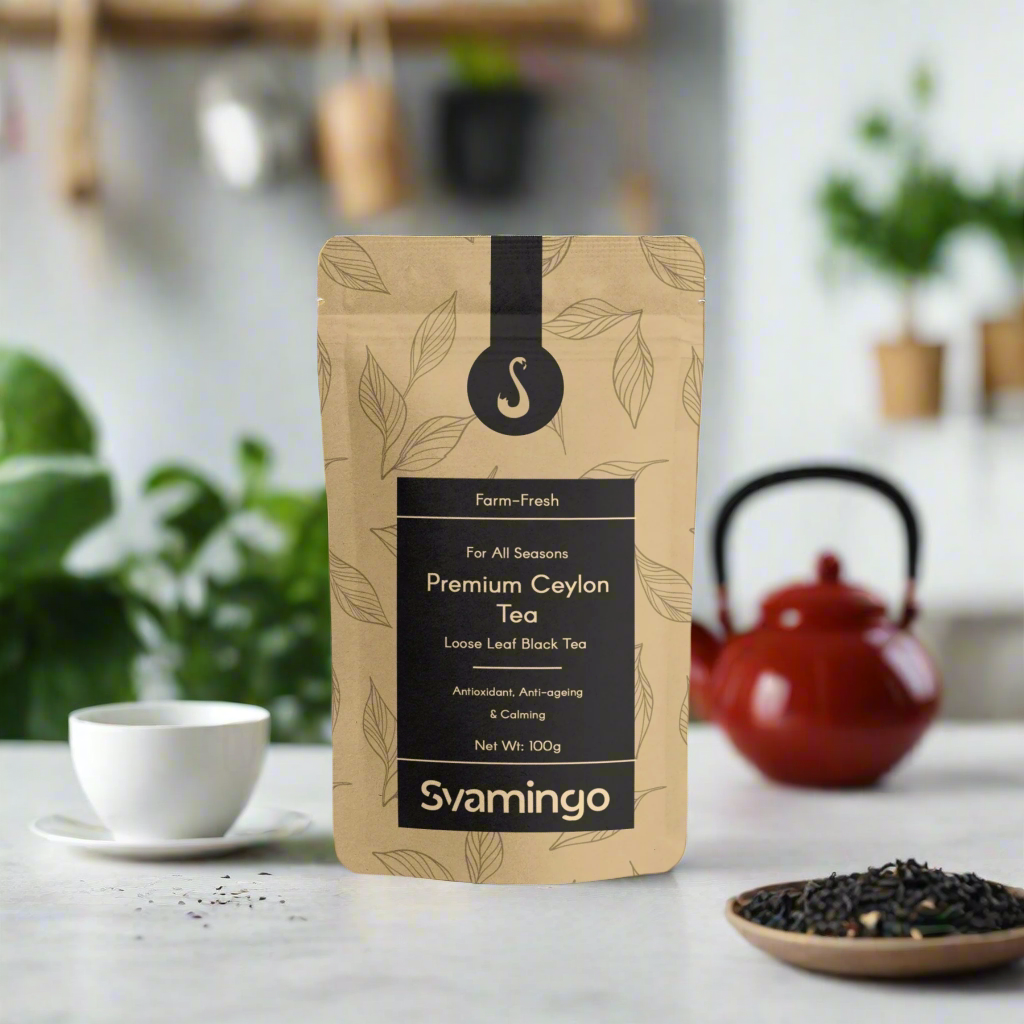 Ceylon black tea pouch next to black tea leaves and tea cup