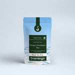 Svamingo Kangra first flush black tea pouch 80g on a plain surface and clean background