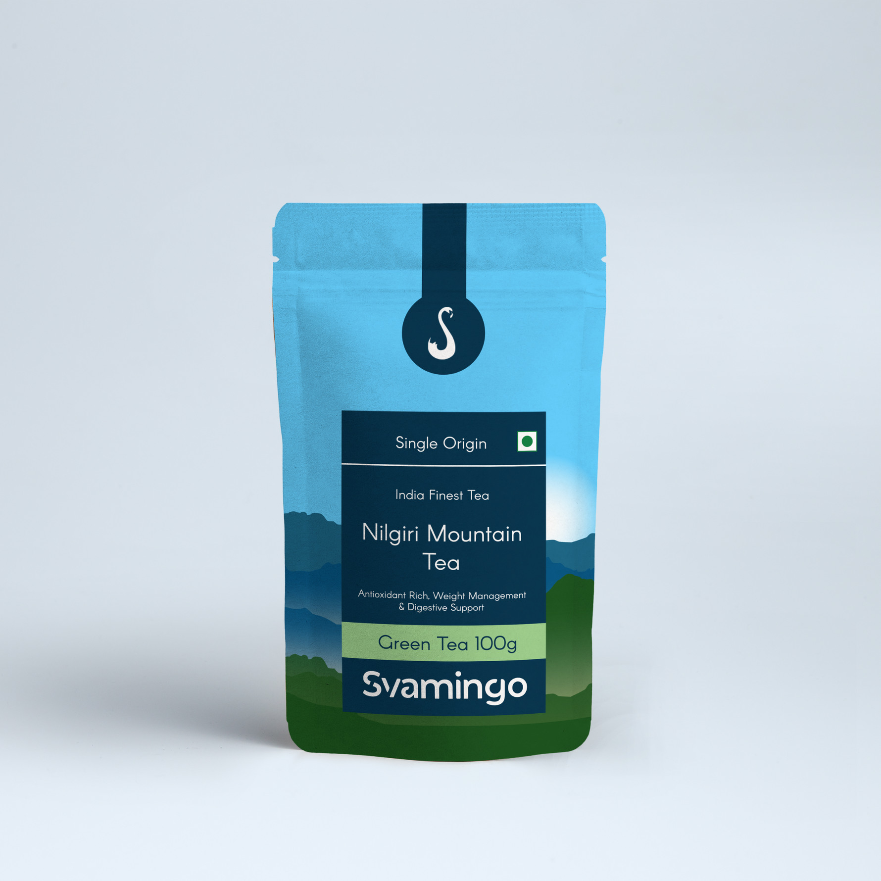 Svamingo Nilgiri green tea pouch 100g on a plain surface and clean background