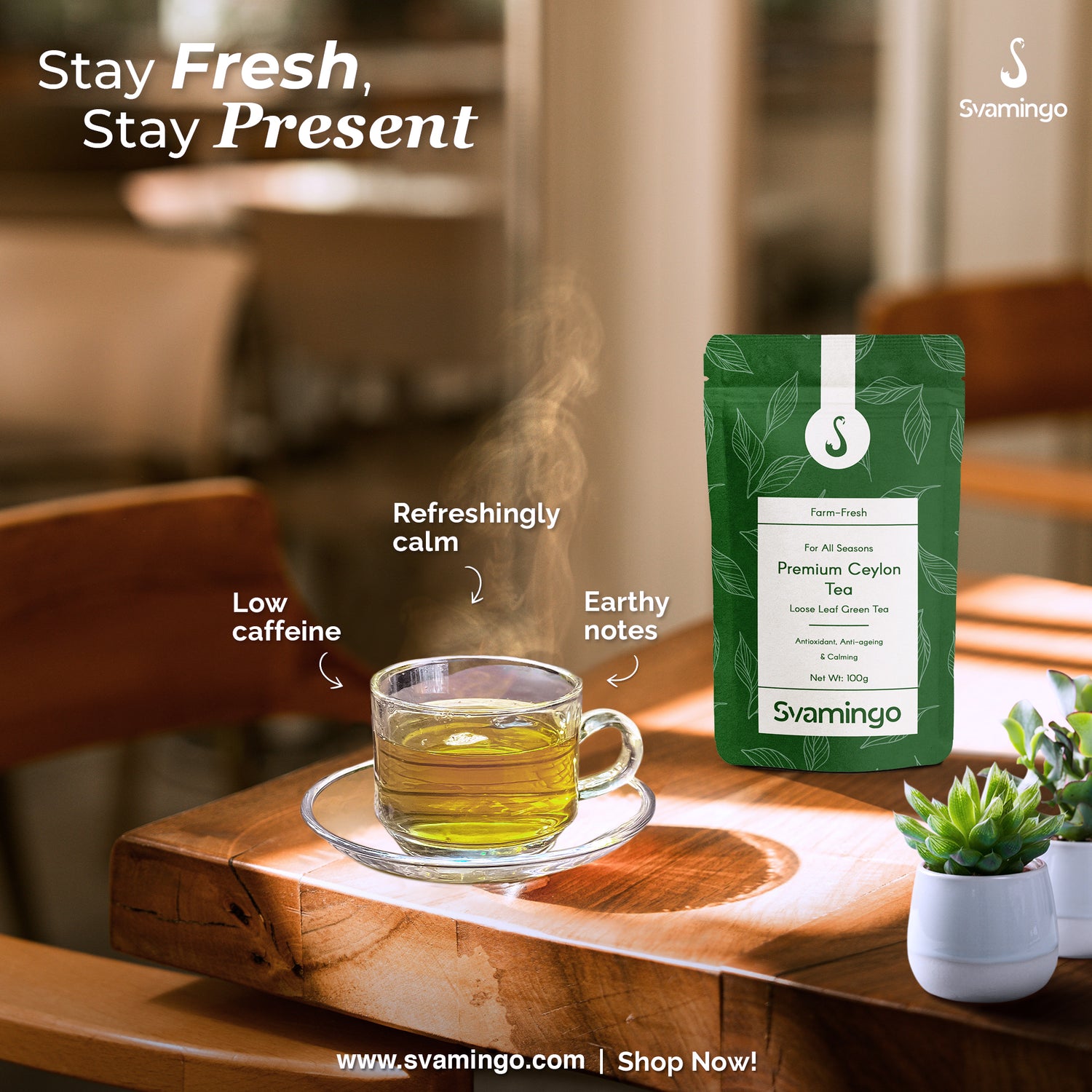 Svamingo ceylon green tea package with a cup of tea on a wooden table, featuring text about tea qualities.